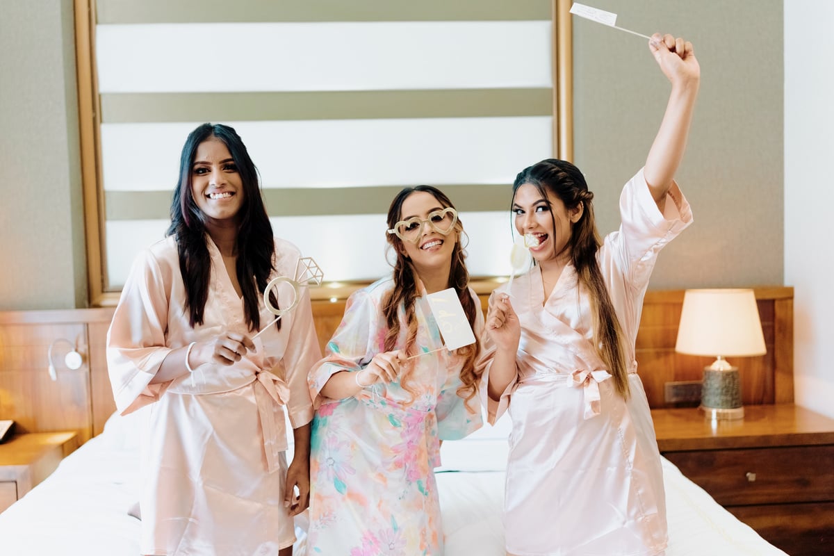 Women in Bathrobes Inside a Room 